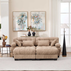 Modern light brown U shaped sectional couch with deep seats, round armrests, ottoman, and four pillows in living room setting