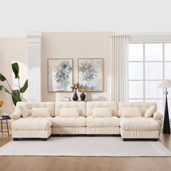 Beige U shaped modular sectional sofa with deep seats, round armrests, and six pillows in a modern living room setting